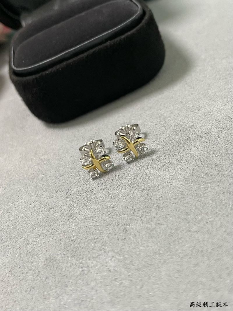 T*f*ny earrings